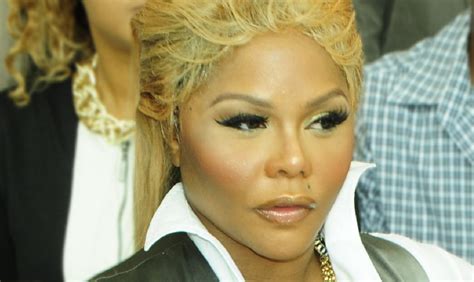 Lil Kim Stuns In Sheer Jumpsuit and 50 Inches of Hair, “No Filter!”.